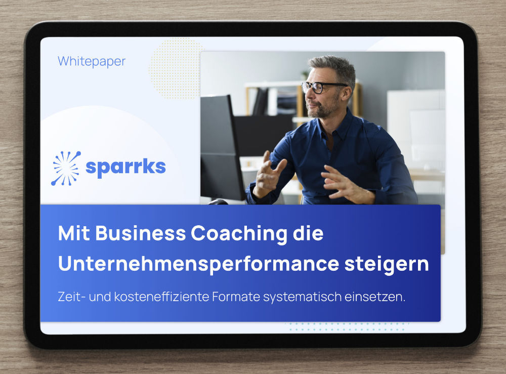 iPad with sparrks´ whitepaper about business coaching impact